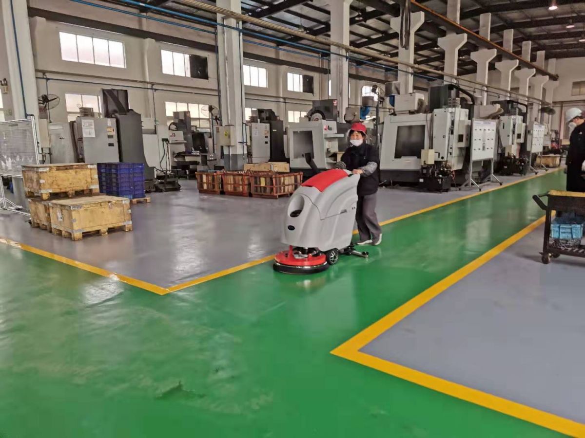 工廠車間地面清洗機(jī)-優(yōu)尼斯手推式全自動(dòng)洗地機(jī)產(chǎn)品圖片